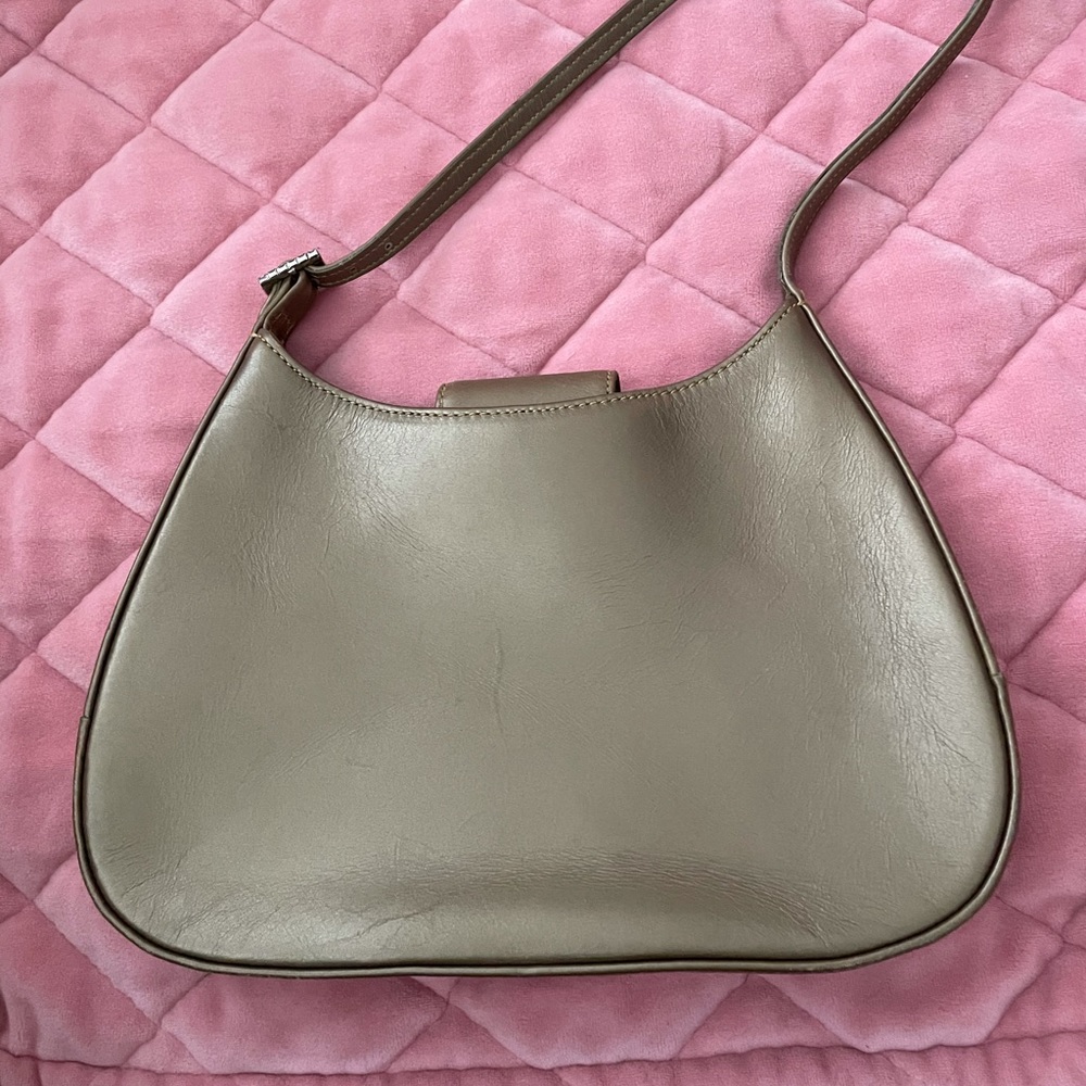 Gold coach bag